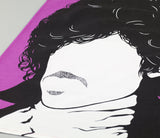 Close up of Prince Rock Icon Tea Towel in Purple