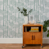 'Holkham Pine Woods' Wallpaper in Seafoam Green