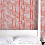 'Holkham Pine Woods' Wallpaper in Sunrise Orange