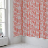 'Holkham Pine Woods' Wallpaper in Sunrise Orange