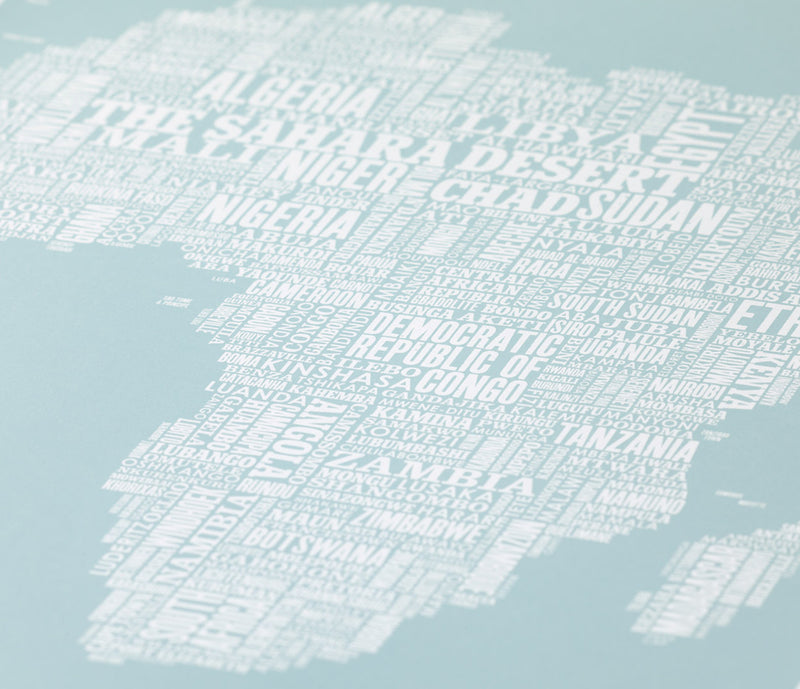 Close up of Africa Type Map screen print in duck egg blue