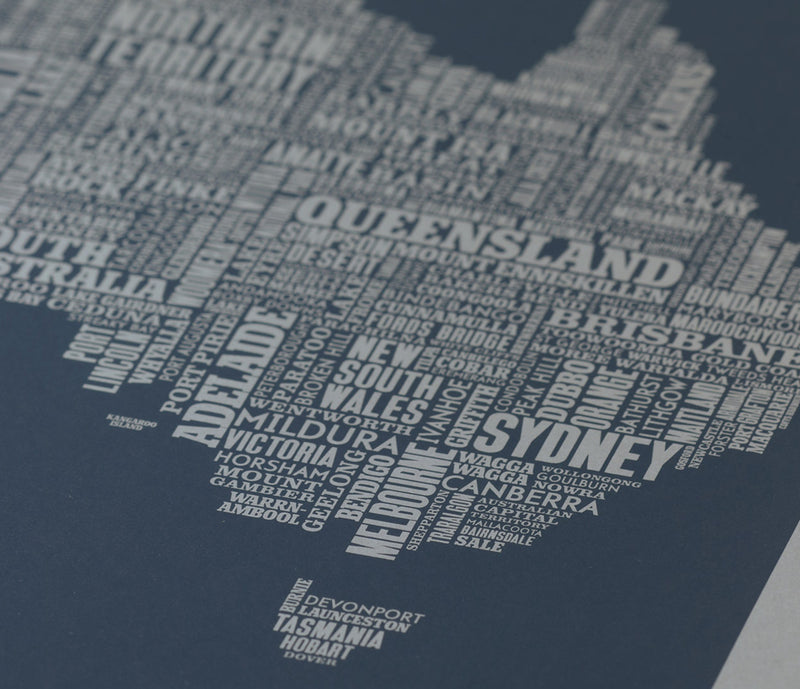 Close up of Australia Type Map limited edition screen print in sheer slate on grey card