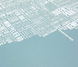 Close up of Brighton Type Map screen print in coastal blue