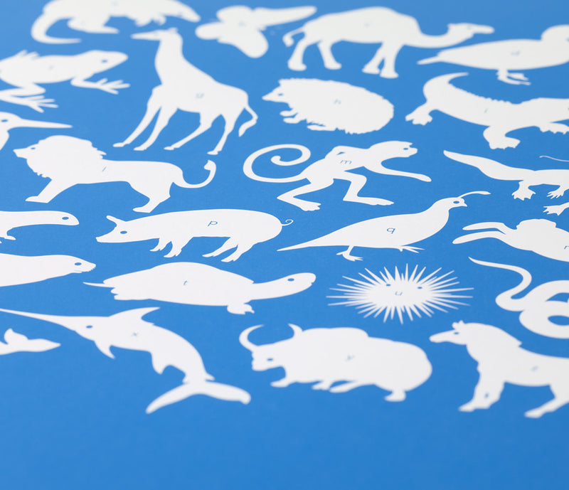 Close up of Creatures A-Z screen print in cobalt blue, economical kids wall art ideas