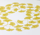 Close up of Ginkgo screen printed poster in yellow moss