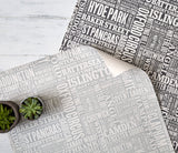 Close up of London Type Wallpaper Design in Slate Grey